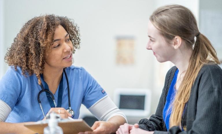 healthcare worker with a patient