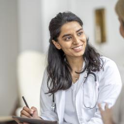 medical professional speaking to a patient