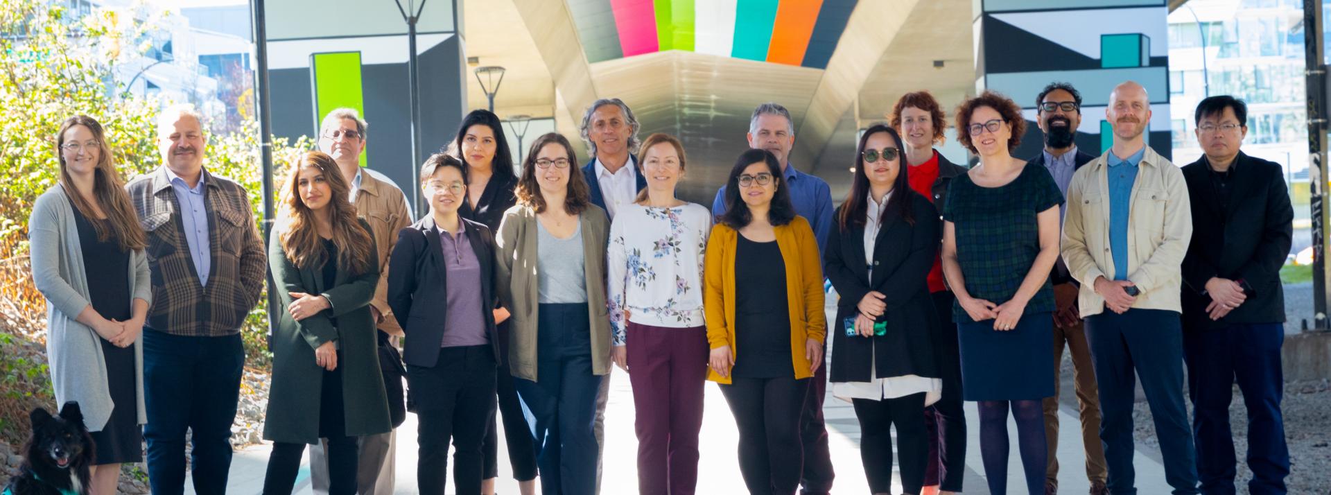 Group of VCH employees standing under bridge