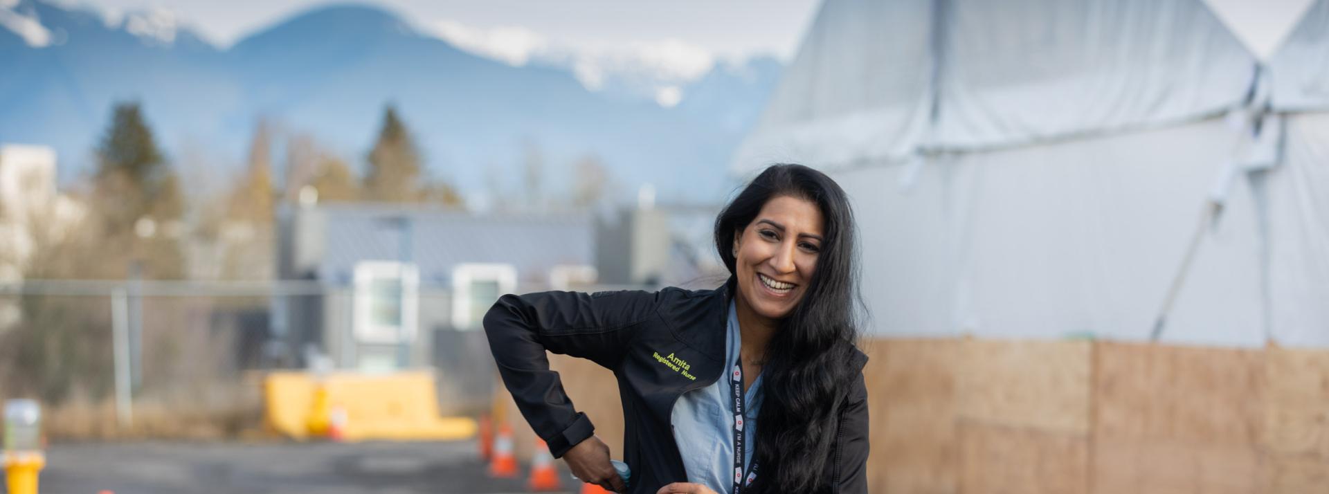 nurse at vaccine tent
