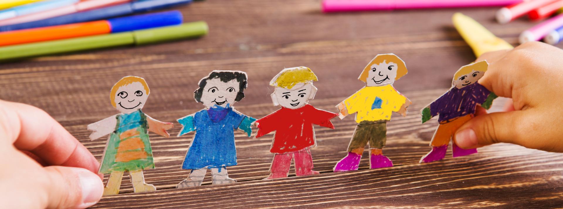 A close up of coloured cutouts of people
