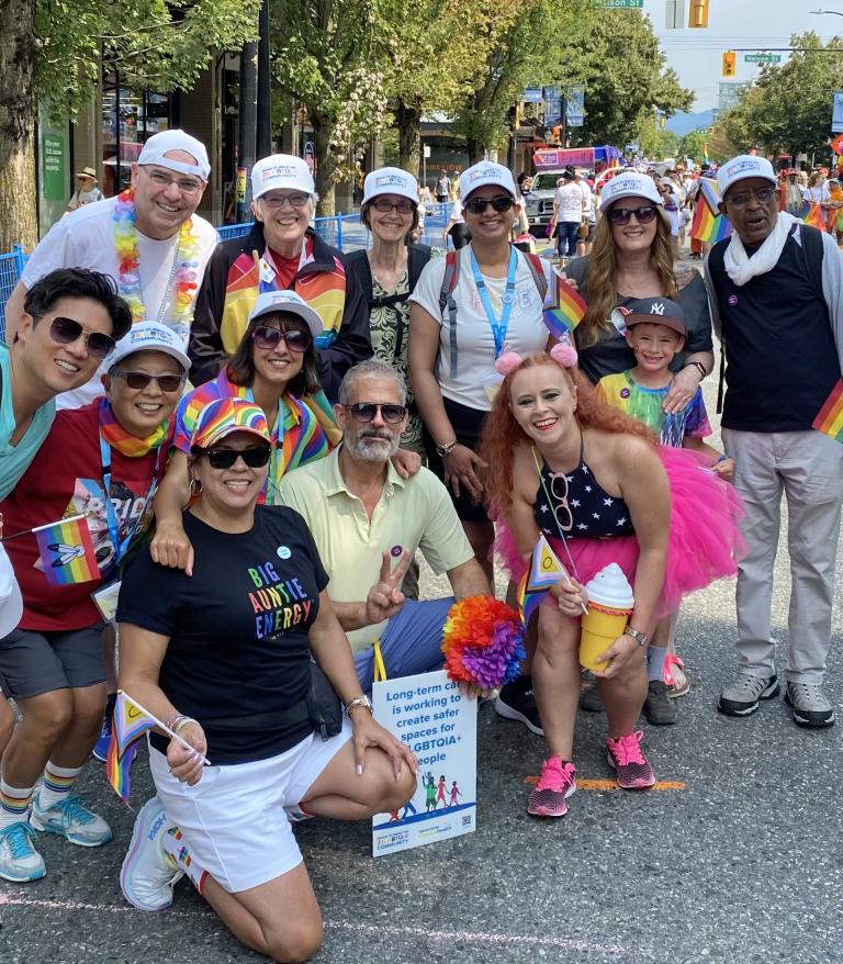 staff posing at Vancouver pride parade