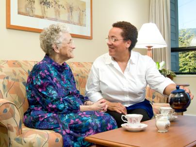 Cedar Gardens Health Care Worker with Resident