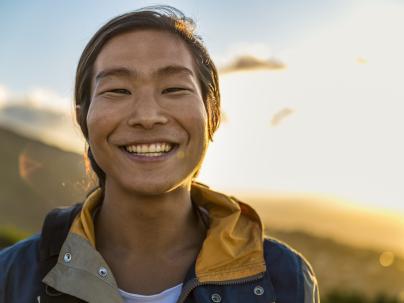 Backpacker smiling at camera